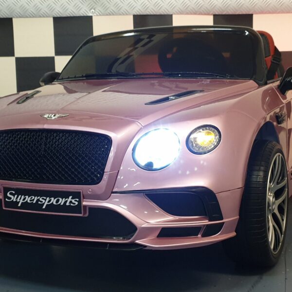 Children's battery toy car Bentley Continental metallic pink